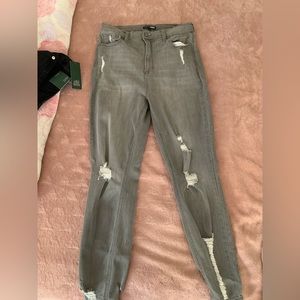 Greg ripped Fashion nova jeans